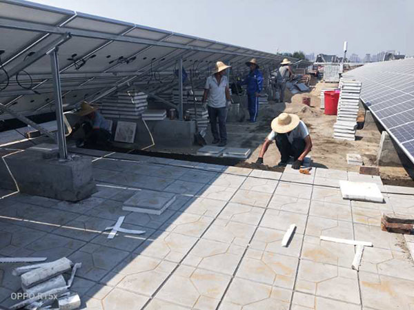 郑东新区众意路小学CXP倒置式屋面保温板施工照片